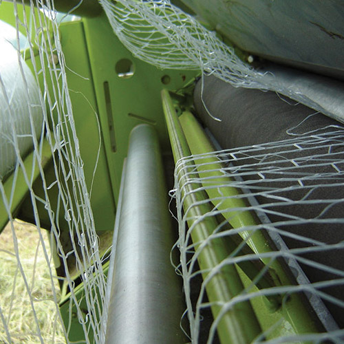 Net wrapping on feeding rollers